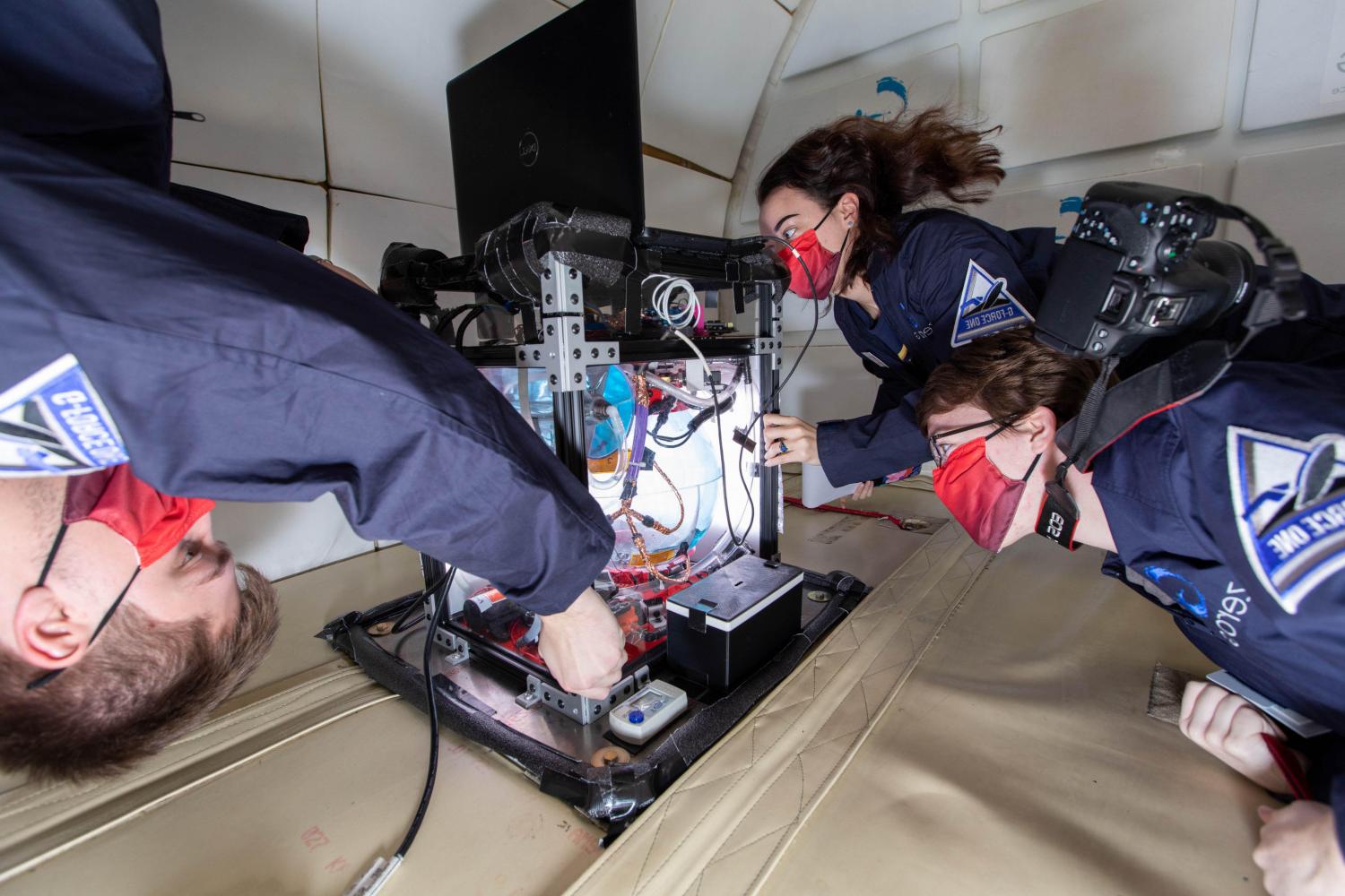 Members of the Carthage College Microgravity Team conduct research aboard NASA's zero g aircraft.